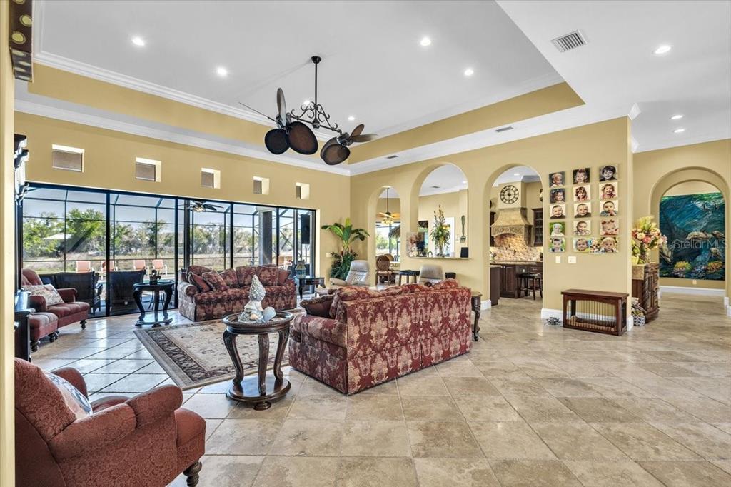 28959 Smugglers Lane Punta Gorda, FL 33982 - Photo 7 of 45 a living room with furniture and a large window