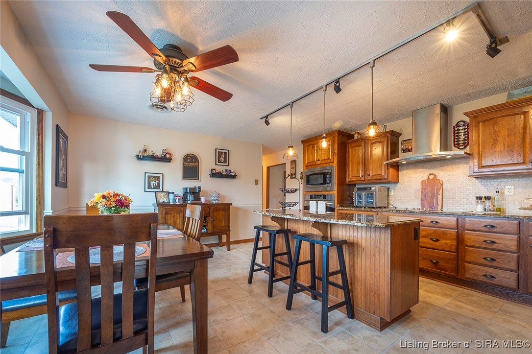 1127 Crone Road Memphis, IN 47143 - Photo 22 of 77 Remodelled kitchen. Haas cabinets, granite coun