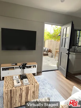 a bathroom with a toilet a sink and shower