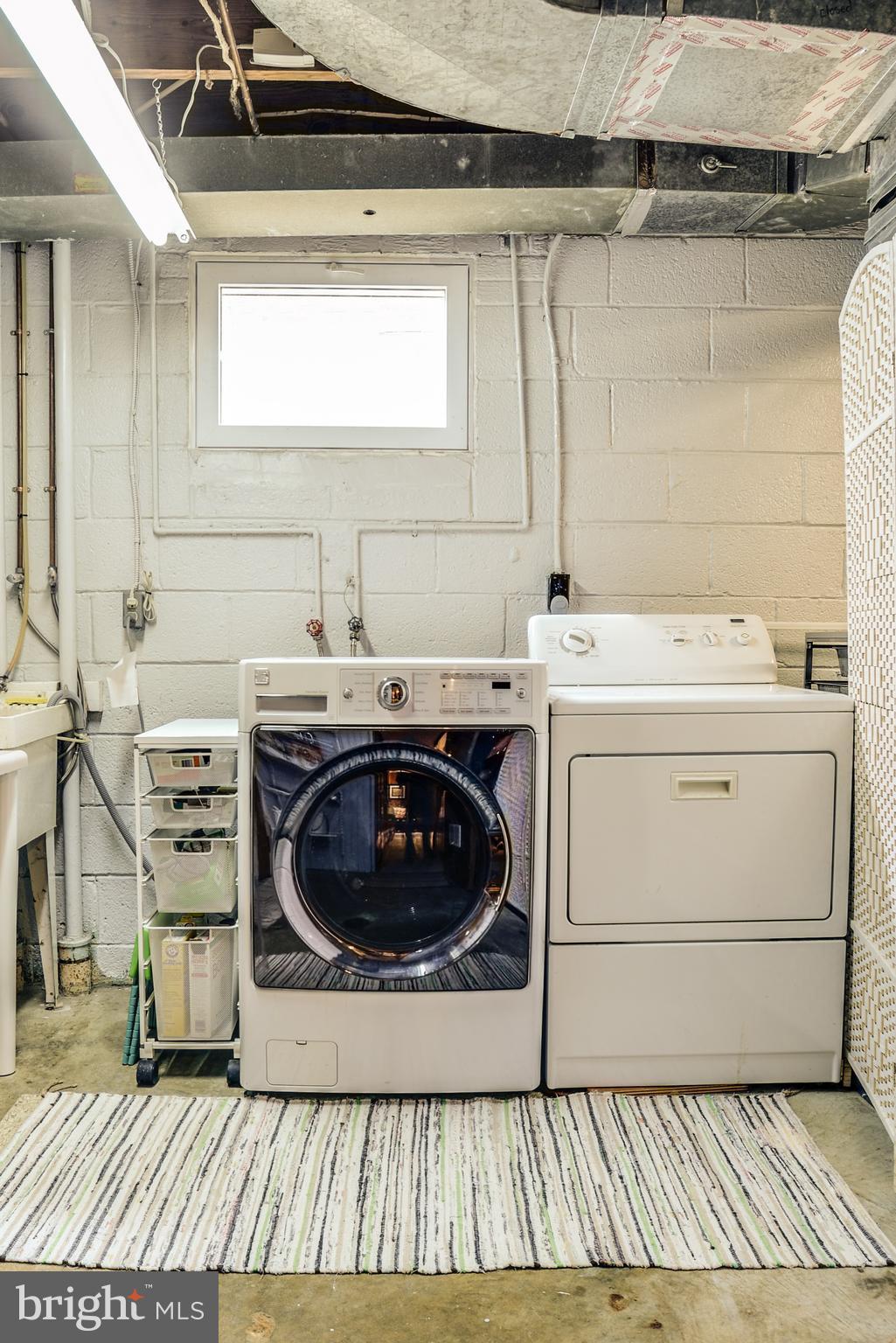 2406 Hayden Drive Silver Spring, MD 20902 - Photo 27 of 30 Back door/laundry area/tool storage behind furnace