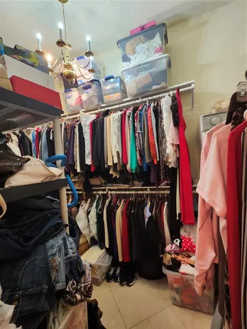 a bed room with a bed and a couch