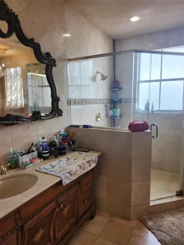 a balcony with furniture and a window