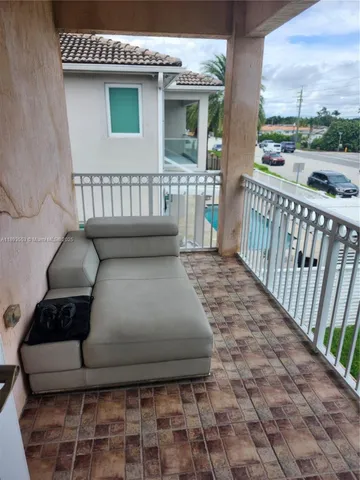 a view of a room with rack on the wall