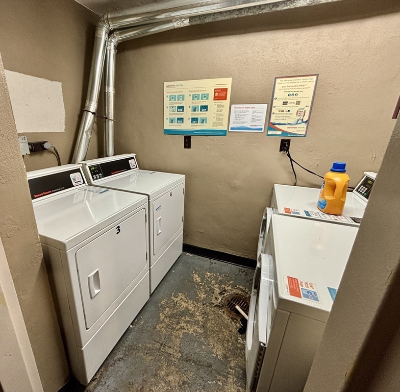 2192 Massachusetts Avenue, Unit 14 Cambridge, MA 02140 - Photo 19 of 19 a utility room with dryer and washer
