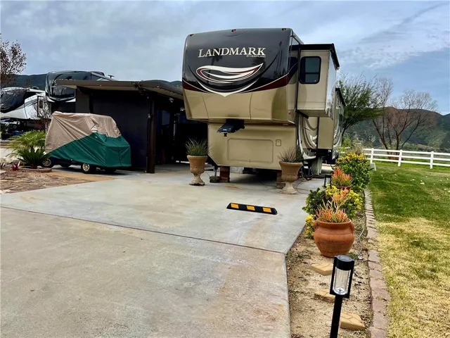 a front view of a house with outdoor seating