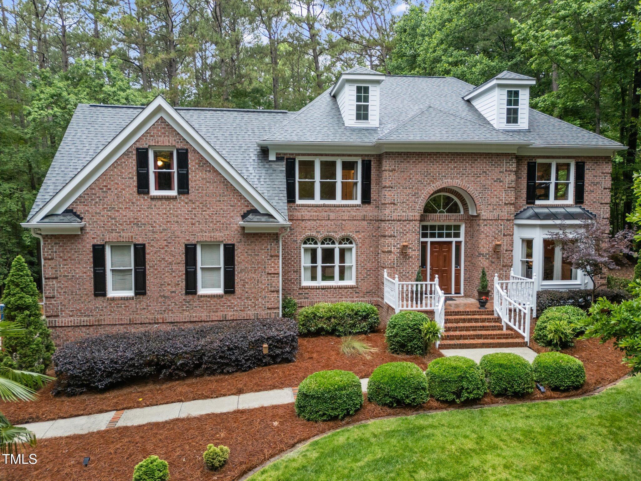 5805 Laurel Rock Lane Raleigh, NC 27613 - Photo 2 of 41 2-web-or-mls-DJI_20250527094124_0935_D