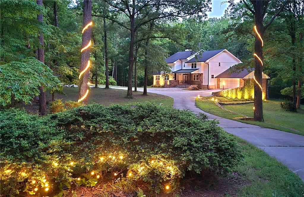 2900 Orchard Road Southwest Conyers, GA 30094 - Photo 56 of 63 an aerial view of a house with a yard and a large tree