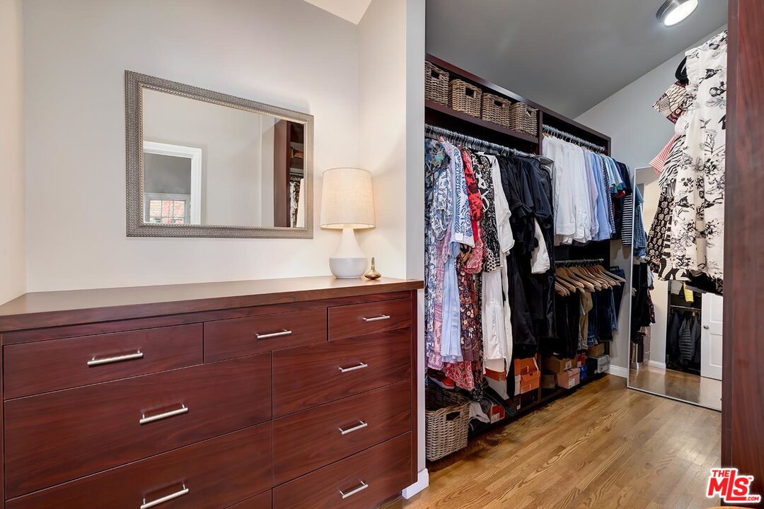 10629 Rountree Road Los Angeles, CA 90064 - Photo 25 of 37 a view of walk in closet with clothes