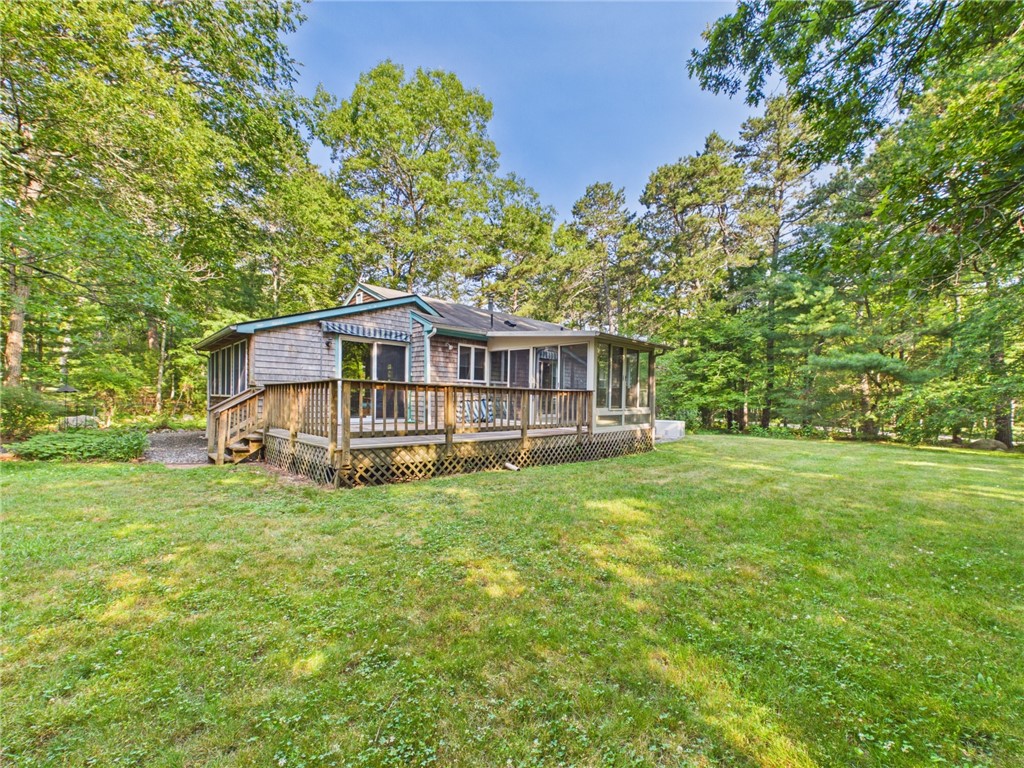 657 Shannock Road South Kingstown, RI 02879 - Photo 4 of 24 Rear deck, awning, enclosed glass porch