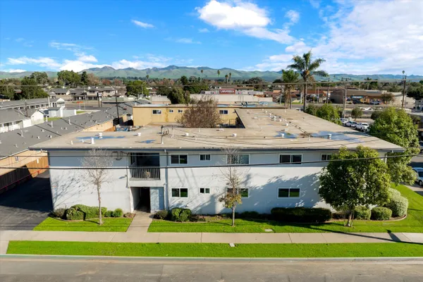 a view of a big yard in front of the house