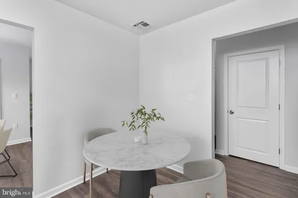 a dining room with table and chair