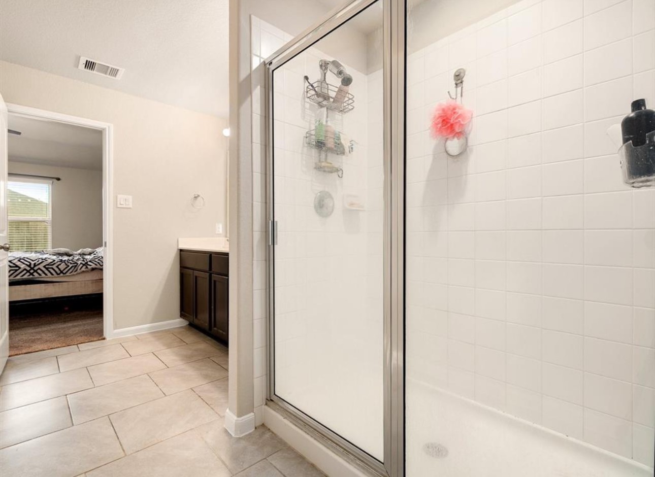 8307 Oakleaf Meadow Court Rosharon, TX 77583 - Photo 5 of 11 a bathroom with a shower and a sink