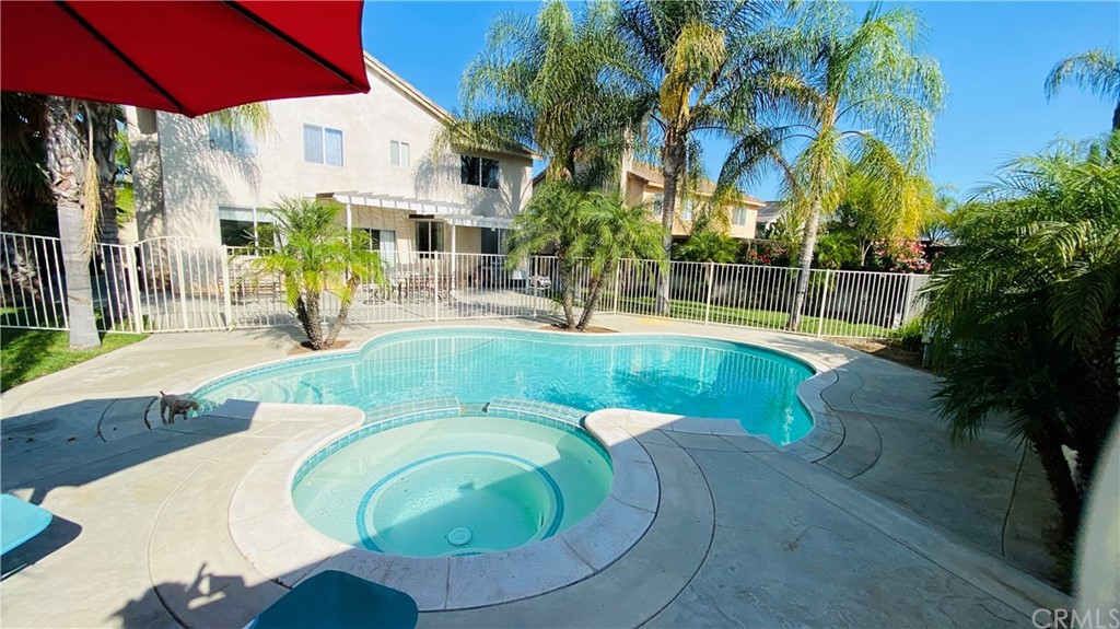 8564 Alexandria Street Riverside, CA 92508 - Photo 1 of 1 a view of a swimming pool with a patio