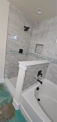 a view of yard with wooden fence