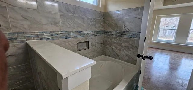 a view of a house with a large window