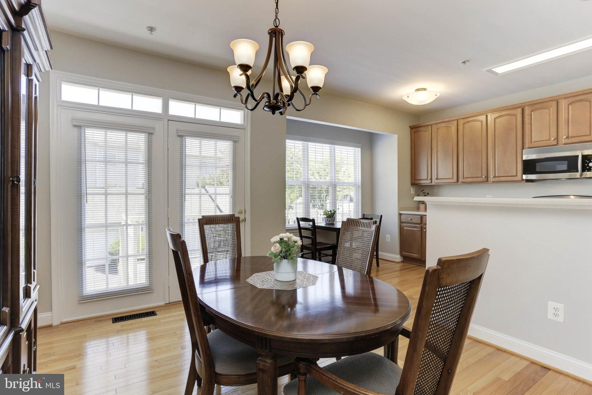 1027 Gaither Road Rockville, MD 20850 - Photo 12 of 71 Main Level - Dining Room, and French Doors to Deck