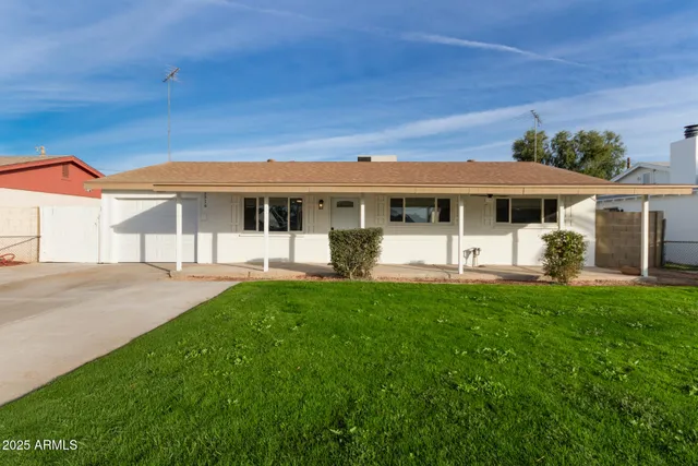 a front view of a house with a patio