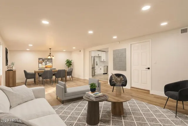 a living room with furniture and a window