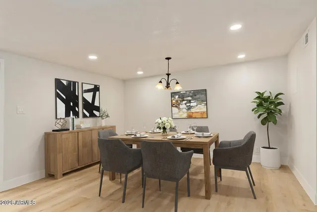 a view of a dining room with furniture