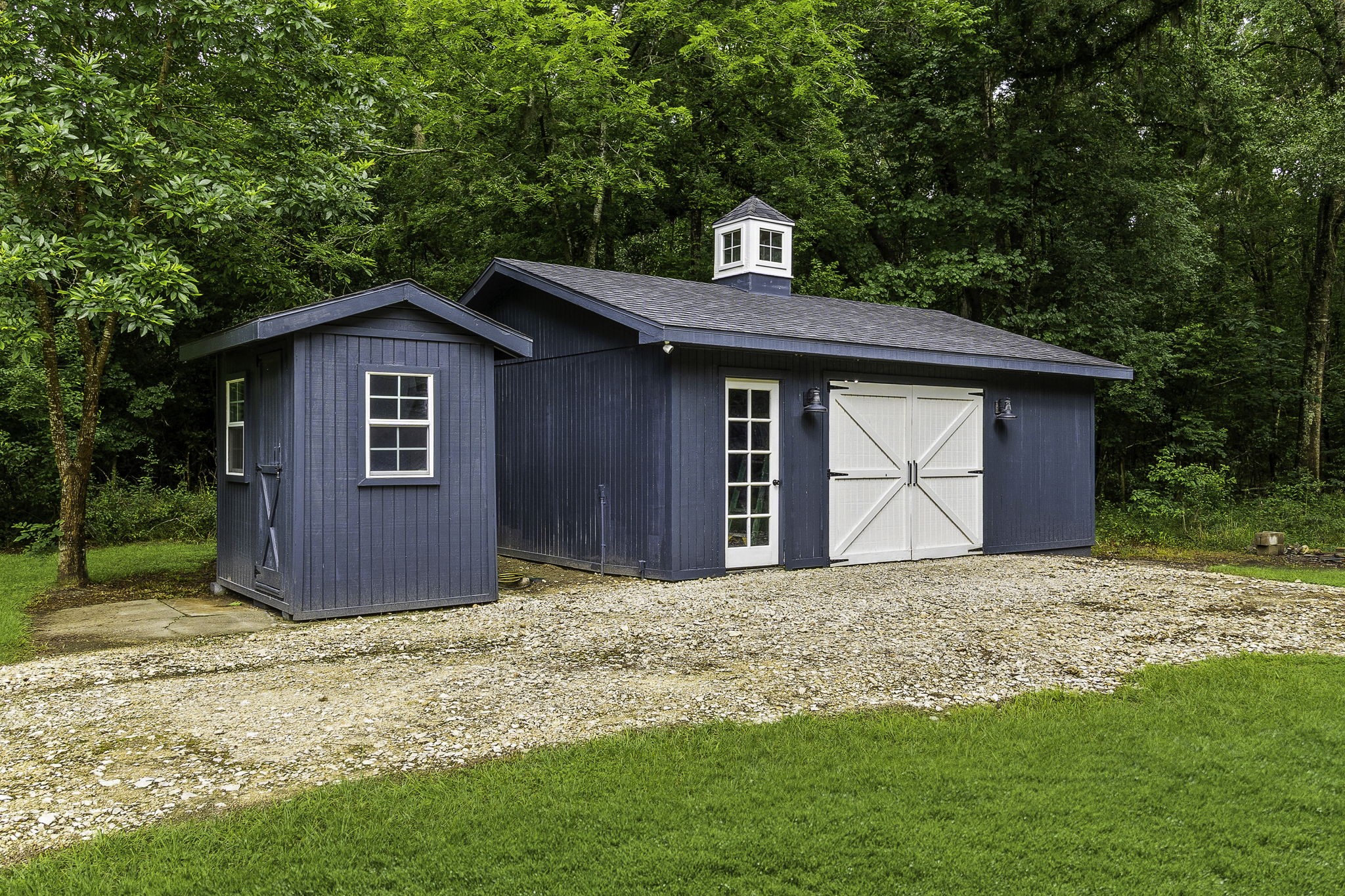 600 Wilderness Road Point Blank, TX 77364 - Photo 26 of 28 Well house with whole-house water filtration system.