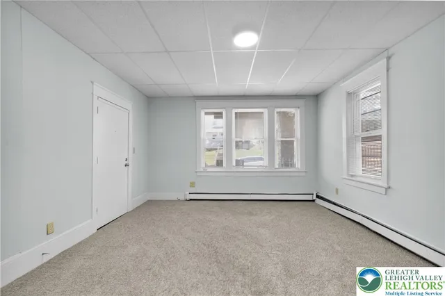 an empty room with windows