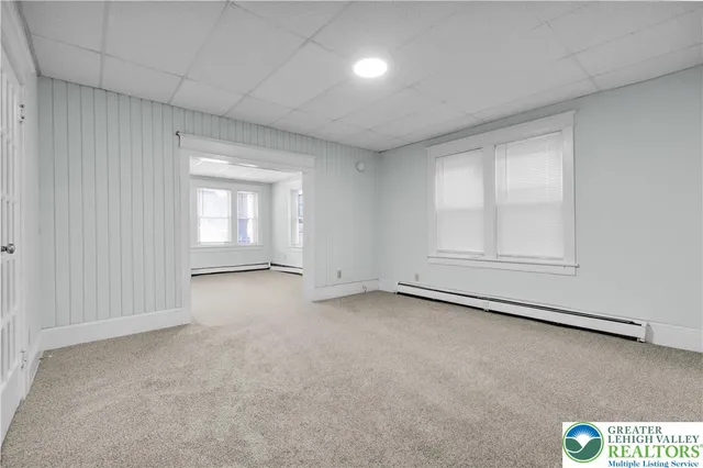 an empty room with windows