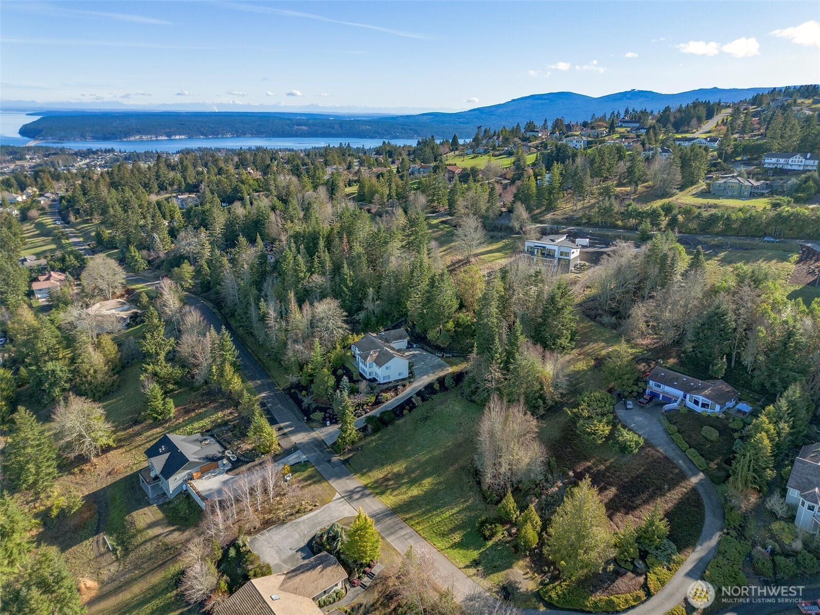 9999 Owls Nest Road Sequim, WA 98382 - Photo 23 of 32 an aerial view of a city