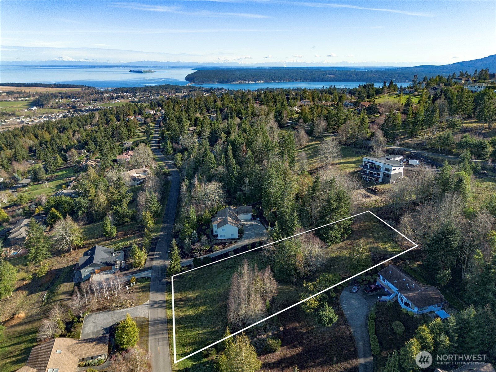 9999 Owls Nest Road Sequim, WA 98382 - Photo 3 of 32 an aerial view of a house with a yard