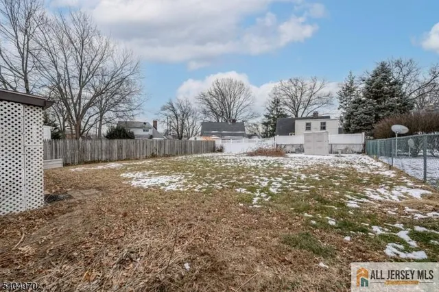 a view of snow on the side of the road
