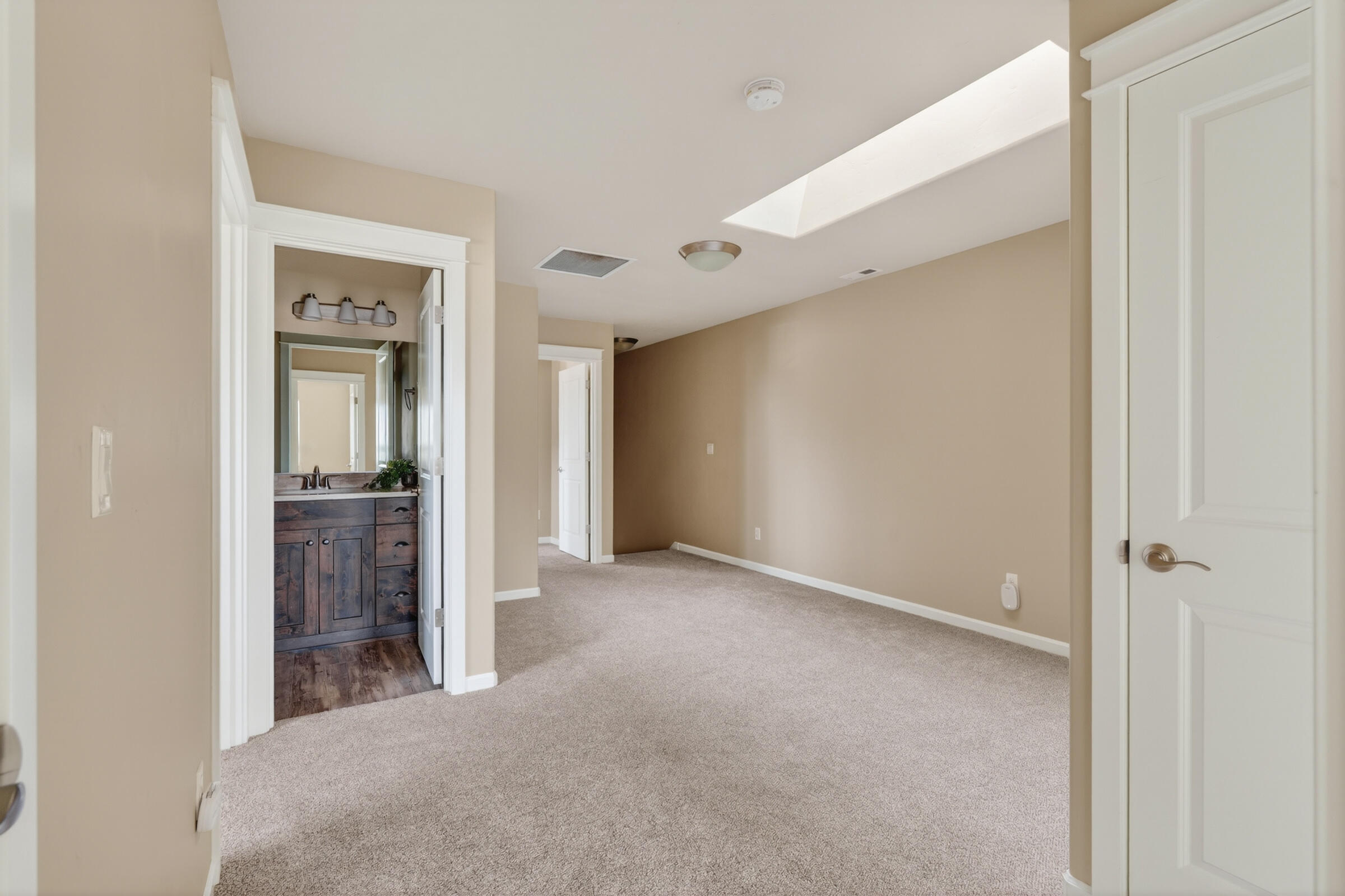 3365 Southwest 28th Street Redmond, OR 97756 - Photo 22 of 39 a view of a room with wooden floor and a bathroom