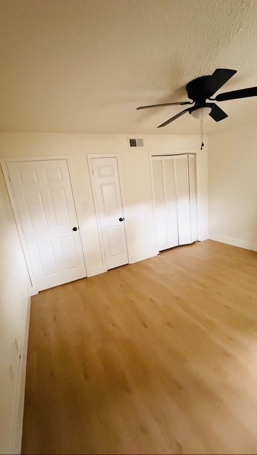 1510 Odd Fellow Street, Unit 21 Conroe, TX 77301 - Photo 2 of 7 a view of room and garage