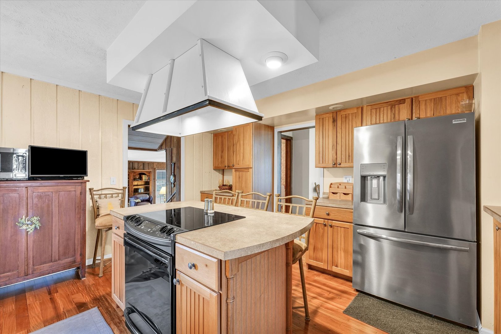 13809 Pine Road Dewitt, IL 61735 - Photo 14 of 46 a kitchen with stainless steel appliances a refrigerator a stove a sink and a refrigerator