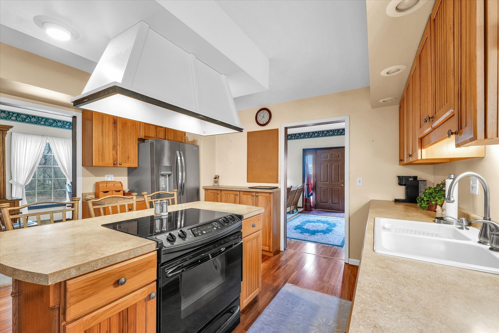 13809 Pine Road Dewitt, IL 61735 - Photo 17 of 46 a kitchen with stove and a sink