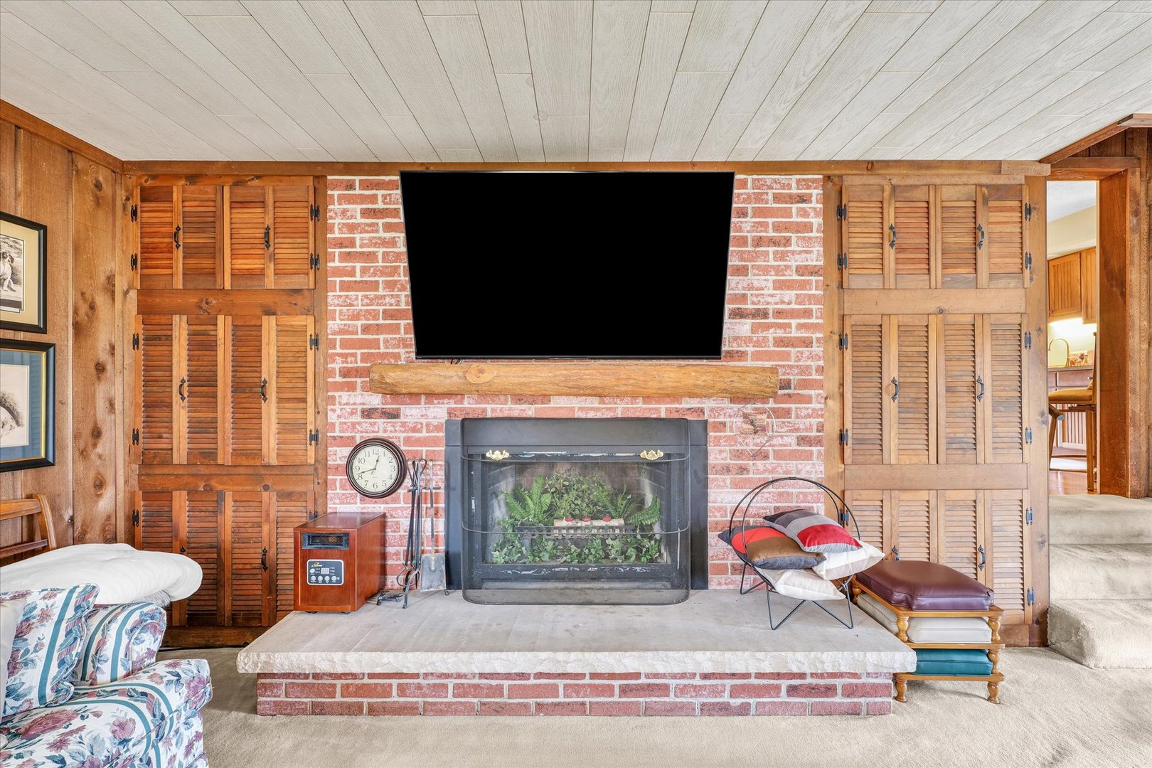13809 Pine Road Dewitt, IL 61735 - Photo 25 of 46 a living room with furniture a flat screen tv and a fireplace