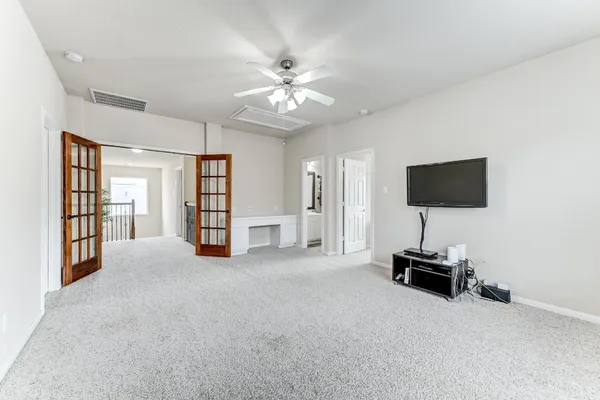 a view of a livingroom with a flat screen tv
