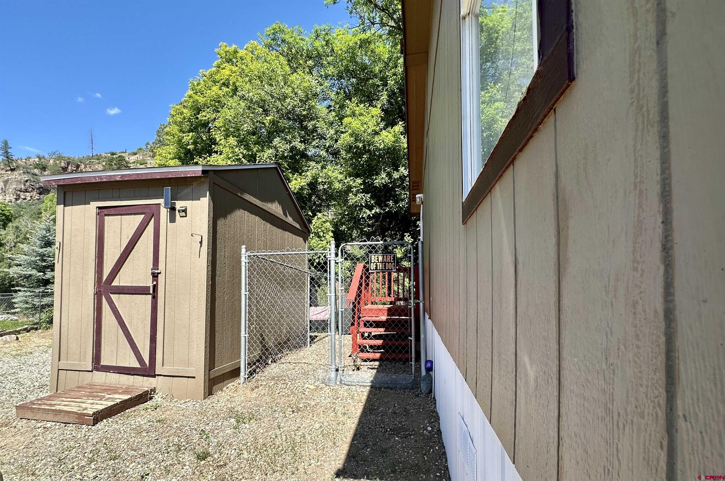 6000 County Road 203, Unit 55 Durango, CO 81301 - Photo 29 of 33 a view of a house with a backyard