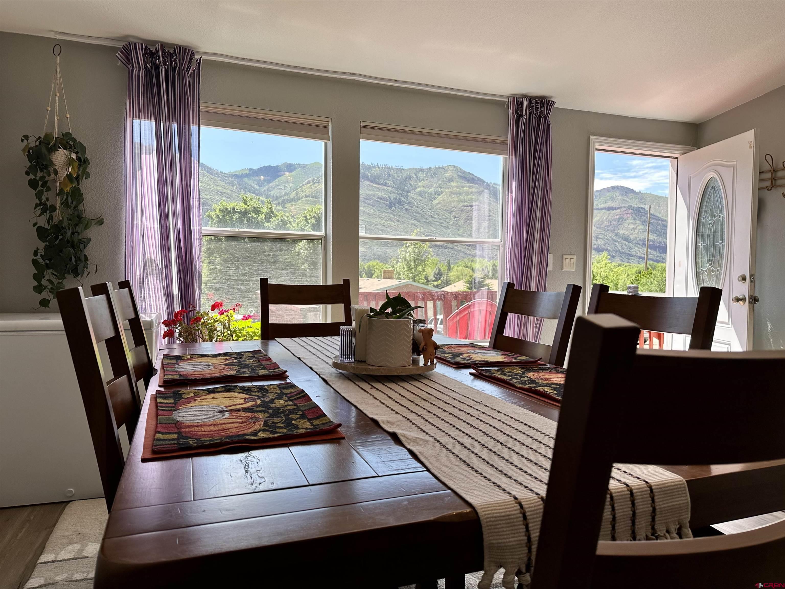 6000 County Road 203, Unit 55 Durango, CO 81301 - Photo 3 of 33 a living room with furniture and a floor to ceiling window