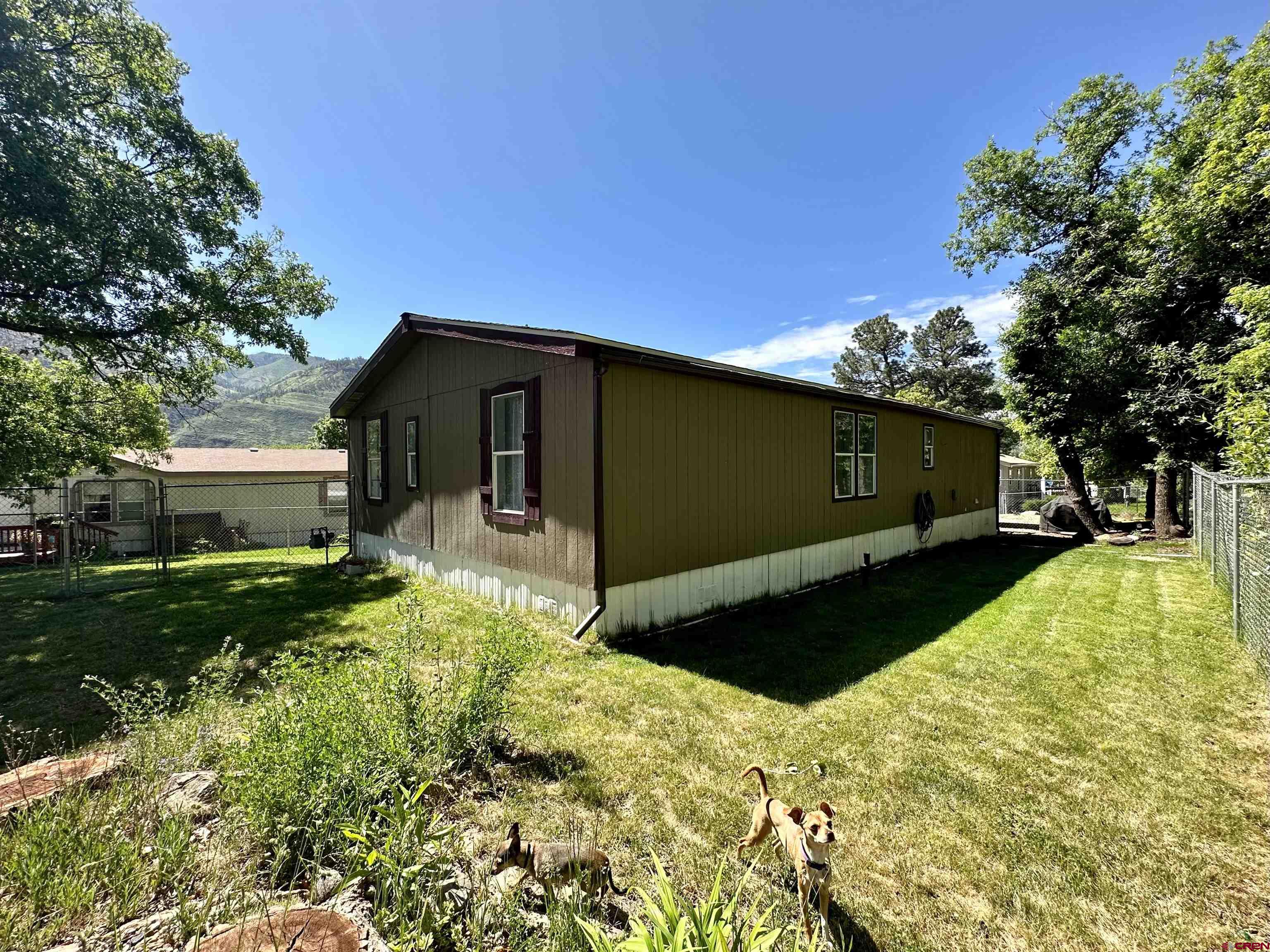 6000 County Road 203, Unit 55 Durango, CO 81301 - Photo 31 of 33 a front view of house with yard