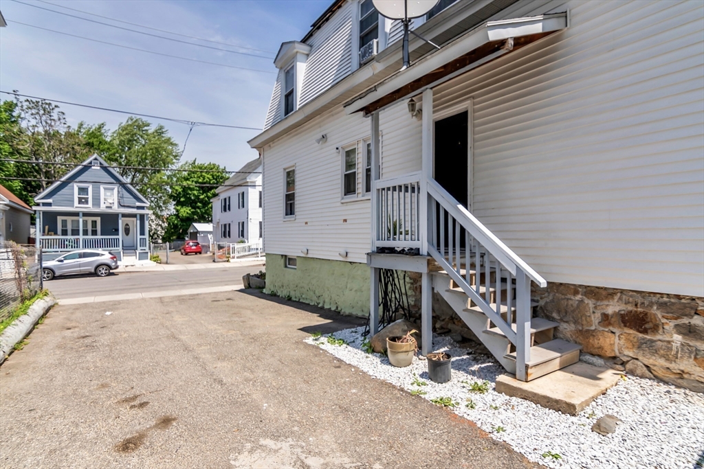 191 Farnham Street Lawrence, MA 01843 - Photo 28 of 31 a view of house with yard and deck area