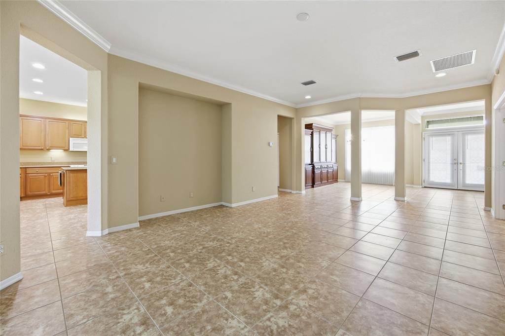 9029 Southeast 130th Loop Summerfield, FL 34491 - Photo 11 of 55 a view of an entryway of a house and livingroom with furniture