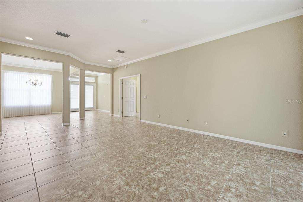9029 Southeast 130th Loop Summerfield, FL 34491 - Photo 12 of 55 a view of an empty room with a window