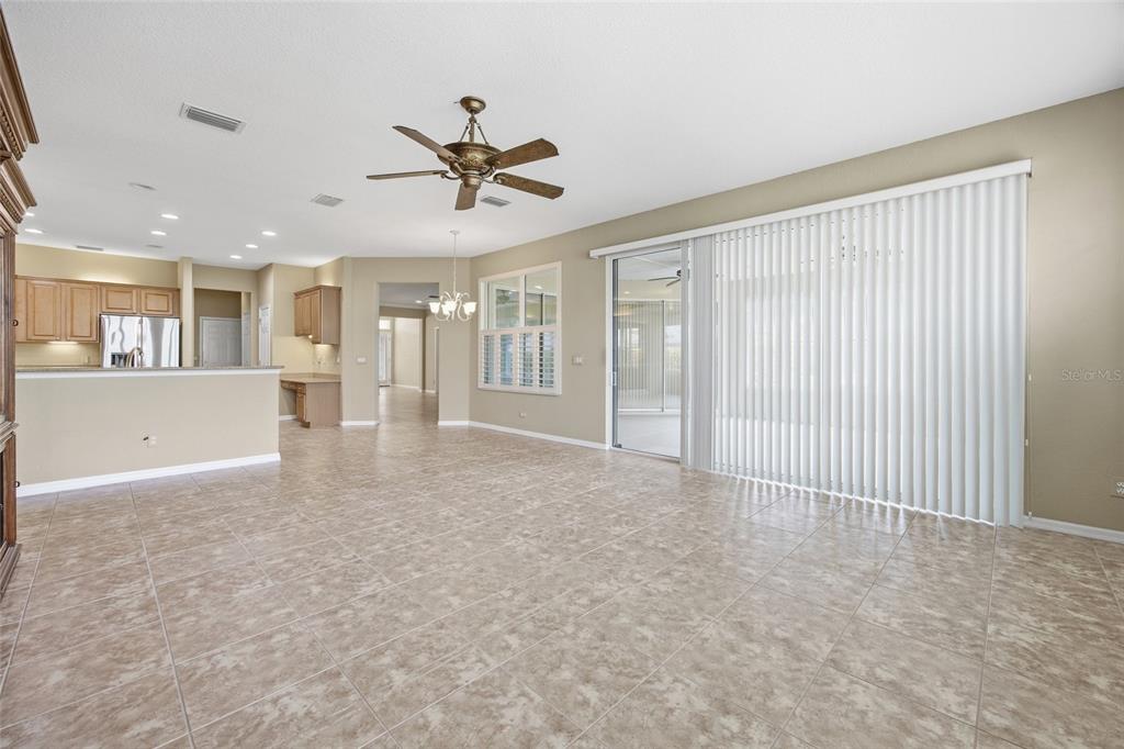 9029 Southeast 130th Loop Summerfield, FL 34491 - Photo 24 of 55 a view of a livingroom with a ceiling fan and window