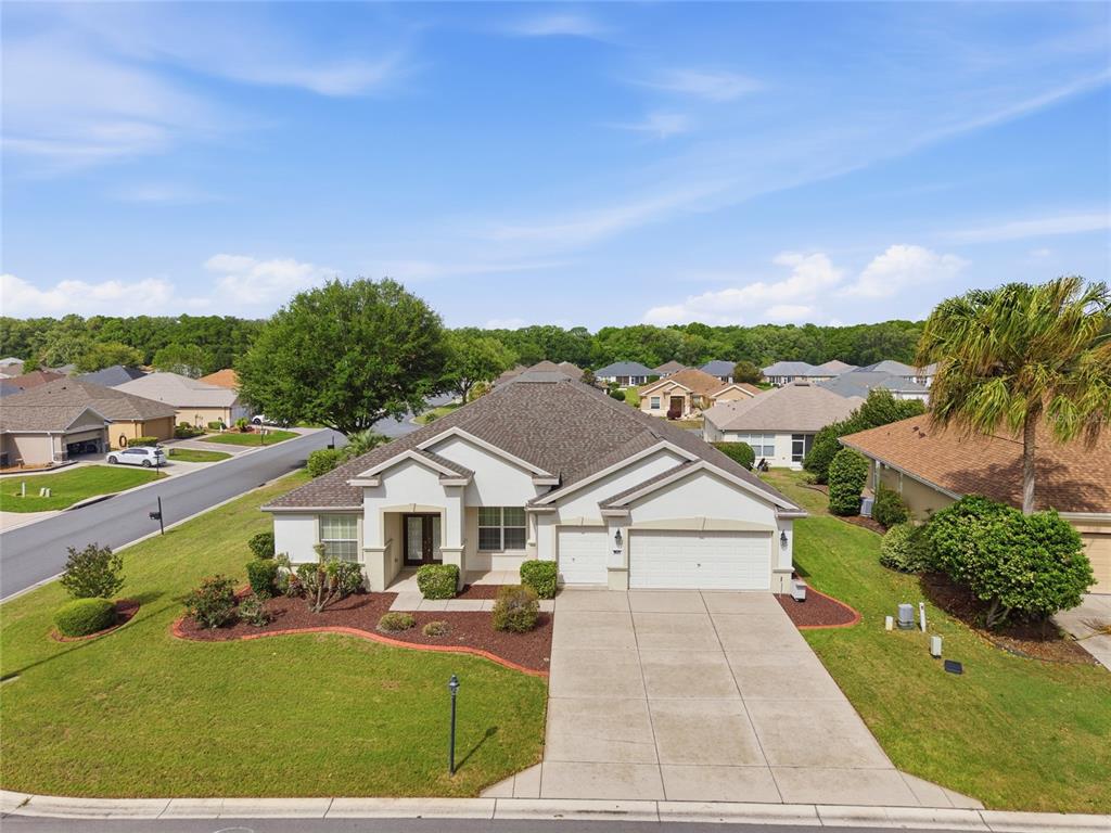 9029 Southeast 130th Loop Summerfield, FL 34491 - Photo 47 of 55 a aerial view of a house with a yard