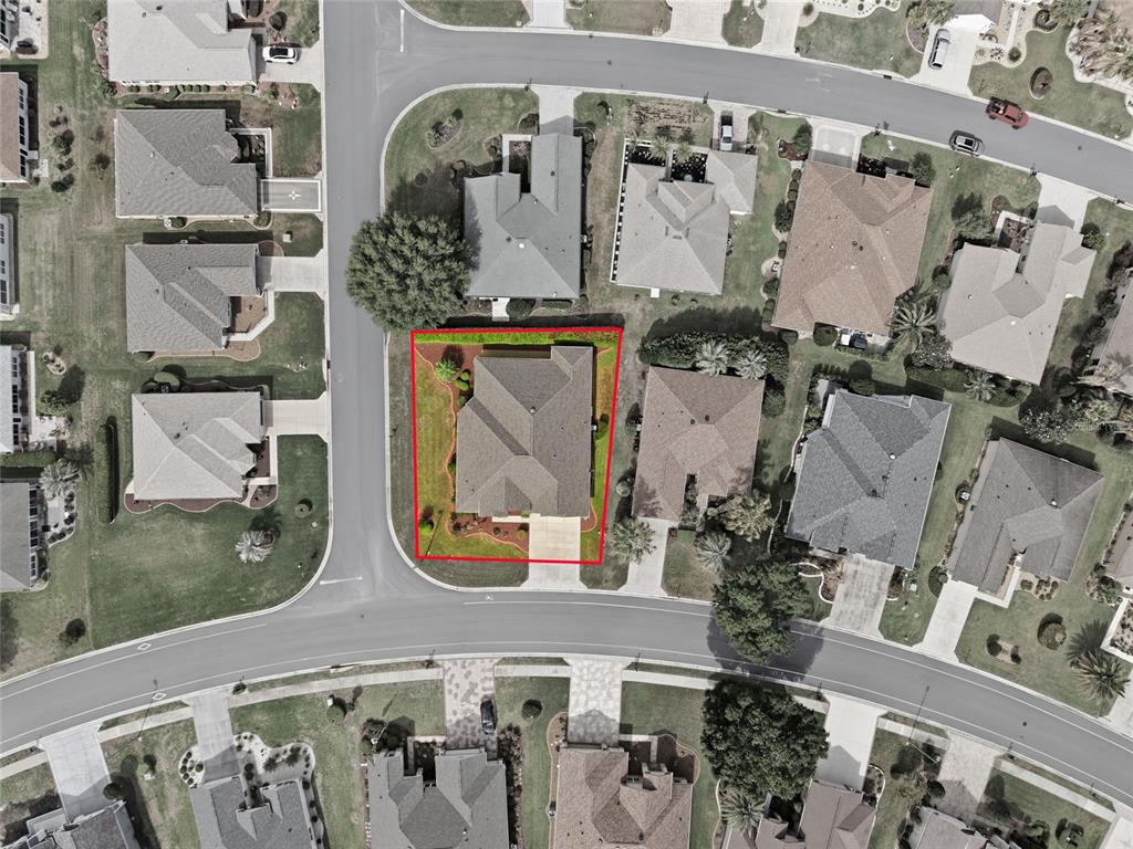 9029 Southeast 130th Loop Summerfield, FL 34491 - Photo 48 of 55 an aerial view of residential houses with outdoor space