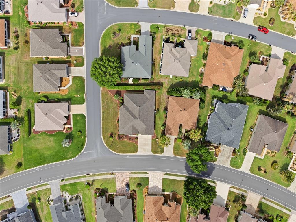 9029 Southeast 130th Loop Summerfield, FL 34491 - Photo 49 of 55 an aerial view of a wooden chairs