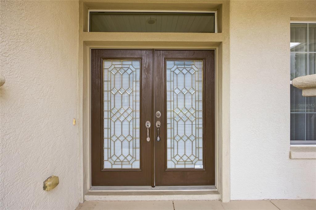 9029 Southeast 130th Loop Summerfield, FL 34491 - Photo 5 of 55 a view of a front door of the house