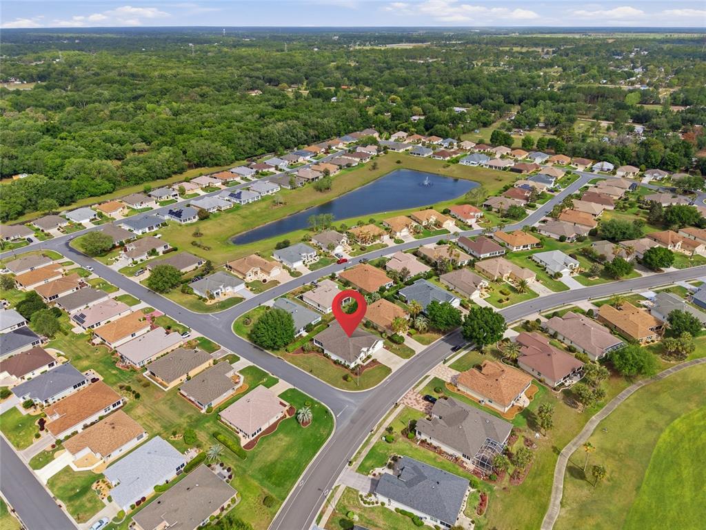 9029 Southeast 130th Loop Summerfield, FL 34491 - Photo 51 of 55 an aerial view of residential houses with outdoor space
