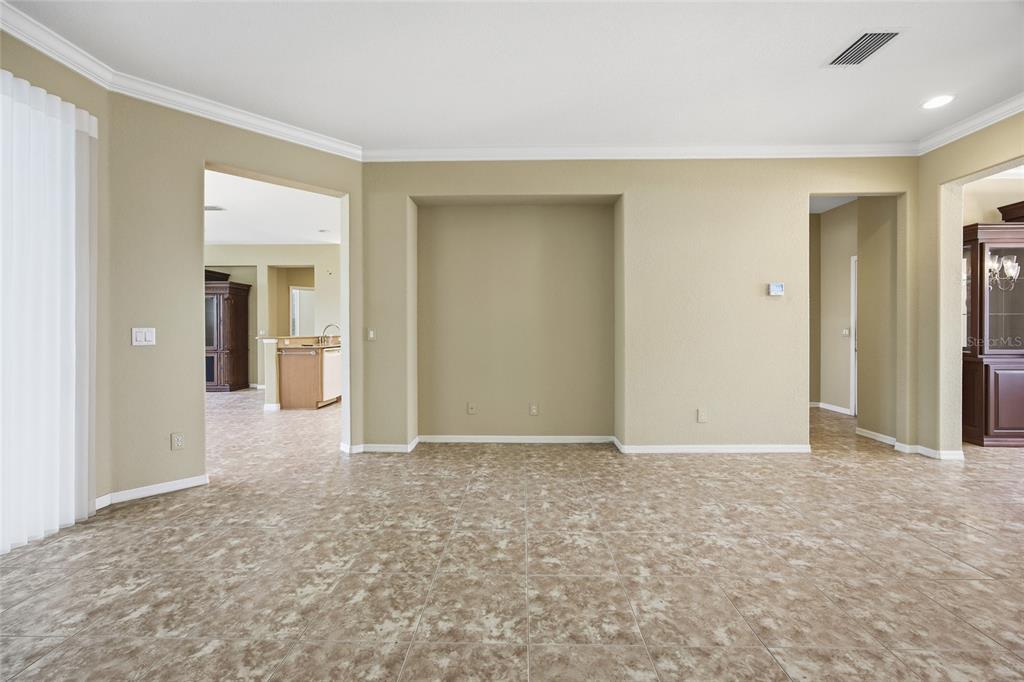 9029 Southeast 130th Loop Summerfield, FL 34491 - Photo 10 of 55 an empty room with a bathroom and a sink