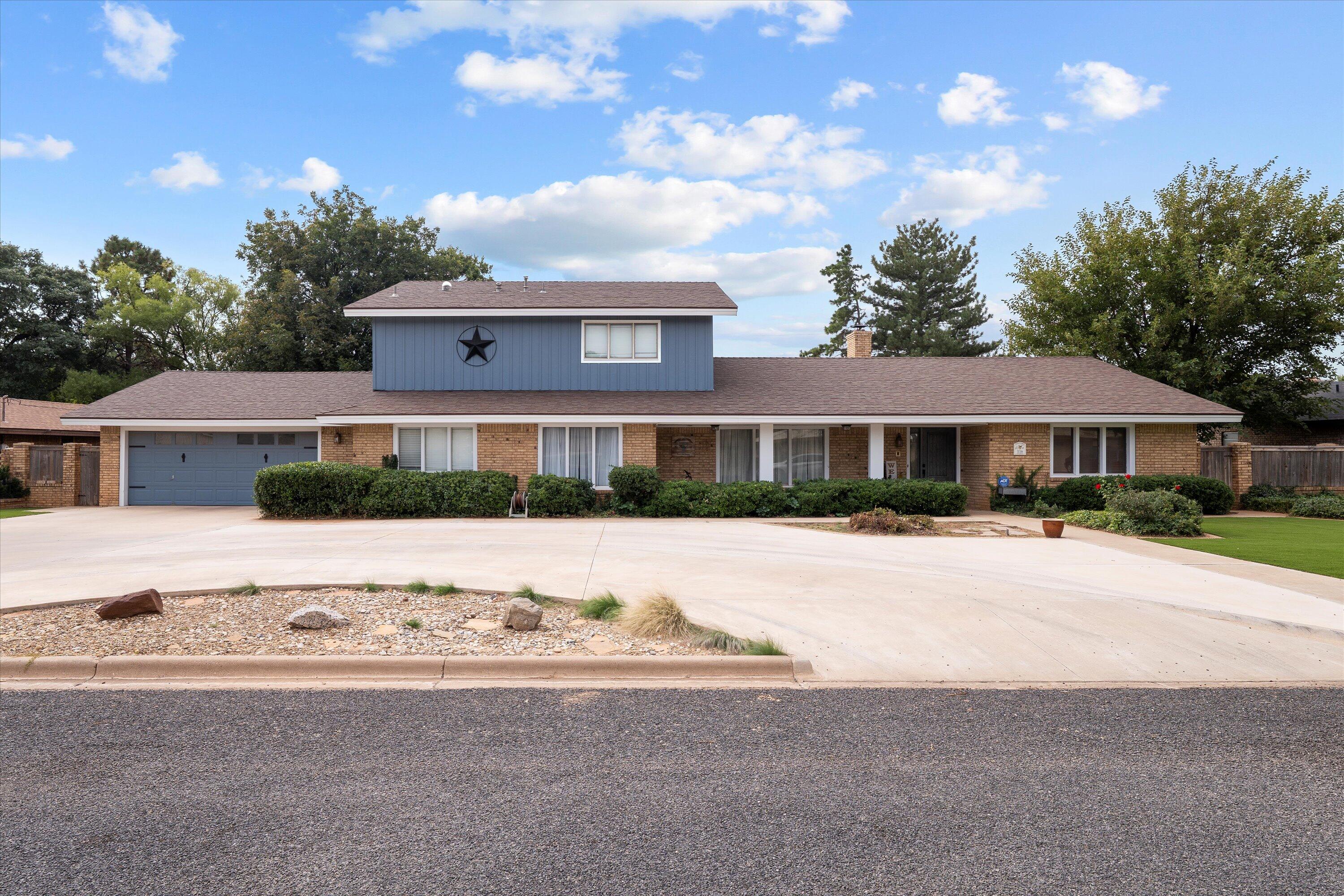 116 East 26th Street Littlefield, TX 79339 - Photo 1 of 40 a front view of house with yard