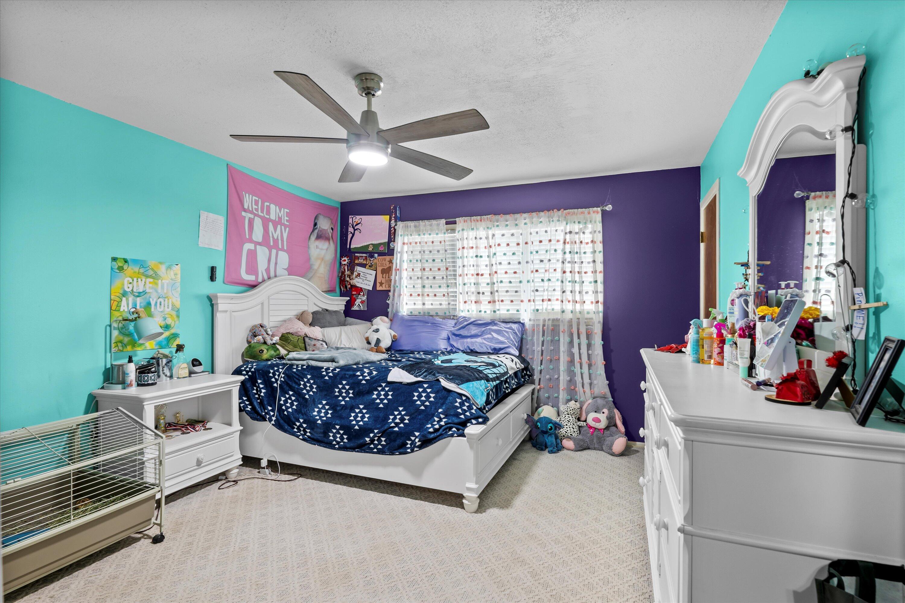 116 East 26th Street Littlefield, TX 79339 - Photo 32 of 40 a bed room with a bed and a window